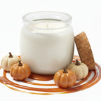 Coconut wax candle in glass jar with cork lid and jasmine flowers on white background.